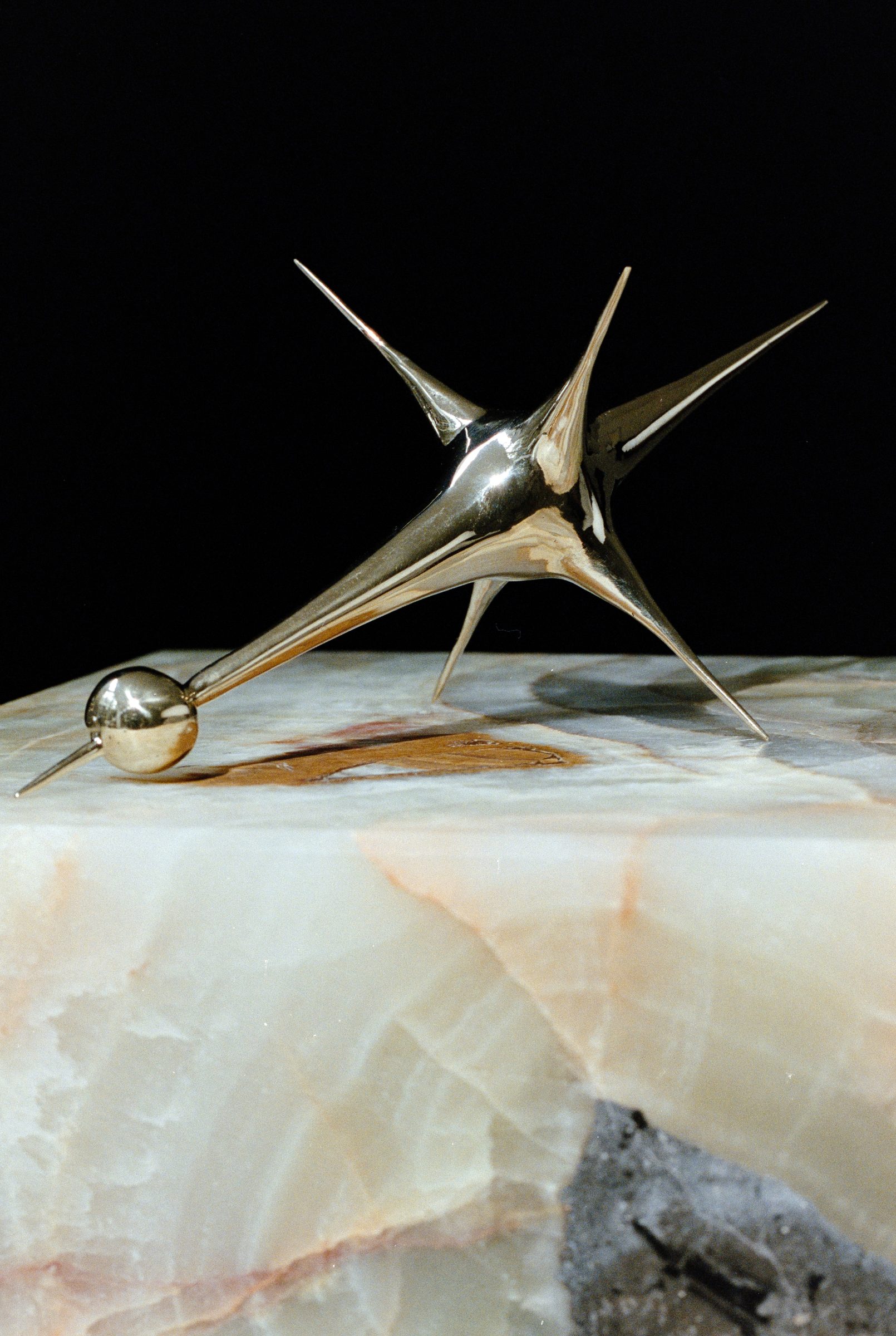 Harmonic Oscillator IV, art by Pilar Zeta, polished bronze, 2026. Photo: Alberto Pinto Mora