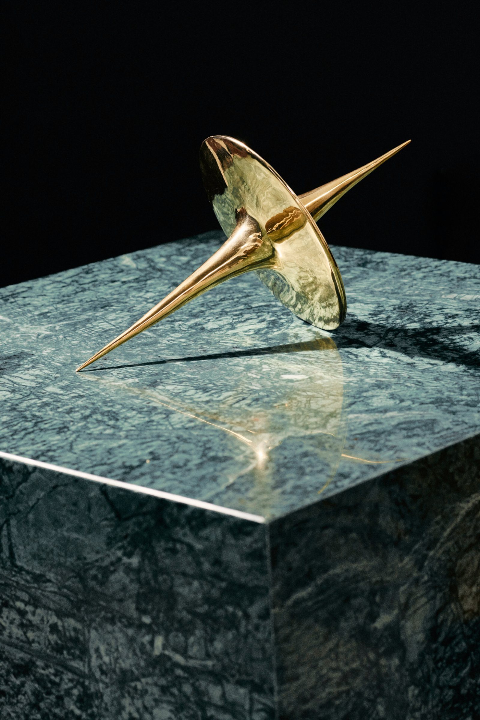 Harmonic Oscillators, art by Pilar Zeta, bronze resting pendulum sculpture photographed for L'Officiel Ibiza, 2026. Photo: Txema Yeste