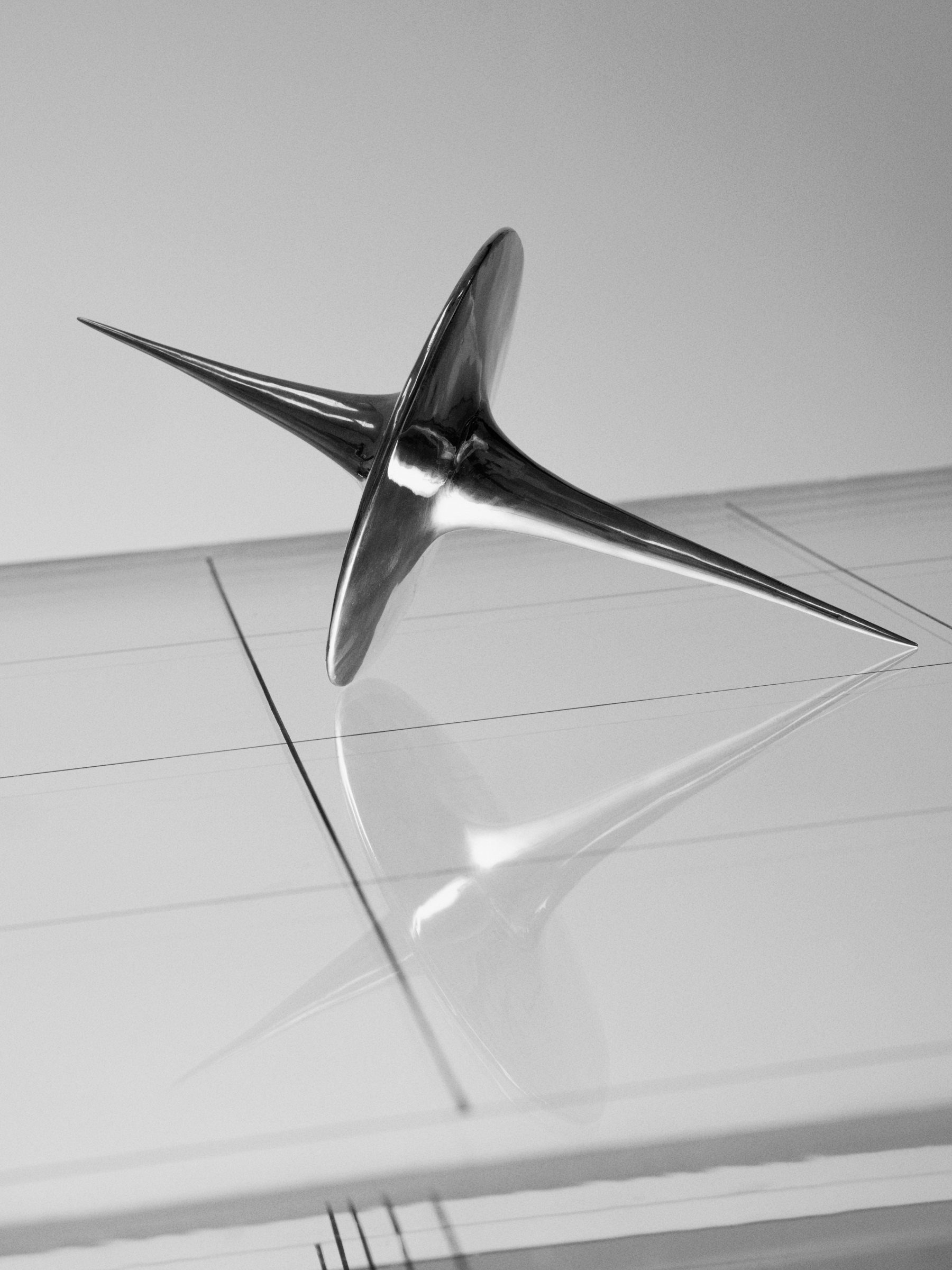 Harmonic Oscillators, art by Pilar Zeta, bronze resting pendulum sculpture photographed for L'Officiel Ibiza, 2026. Photo: Txema Yeste