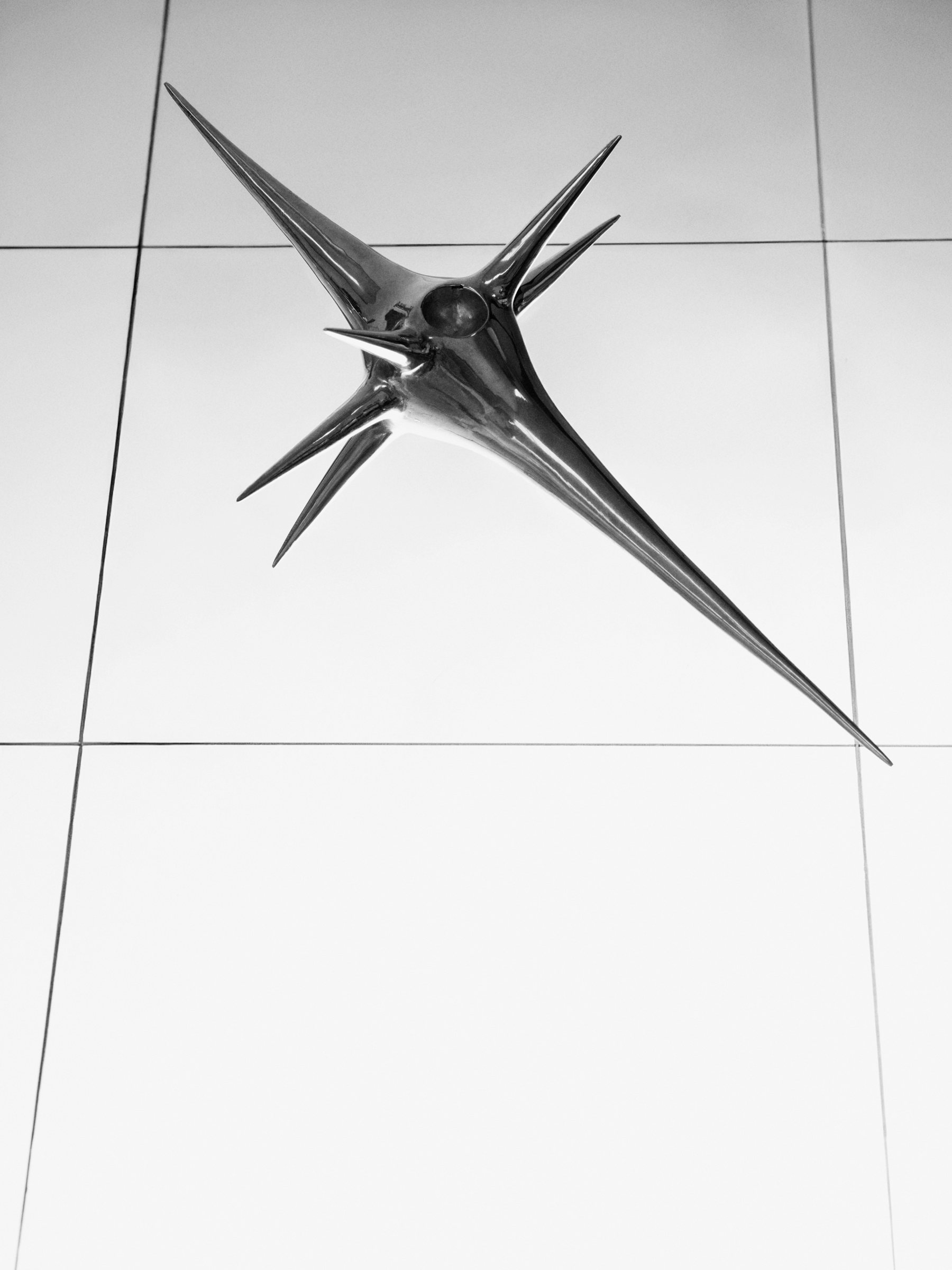 Harmonic Oscillators, art by Pilar Zeta, bronze resting pendulum sculpture photographed for L'Officiel Ibiza, 2026. Photo: Txema Yeste