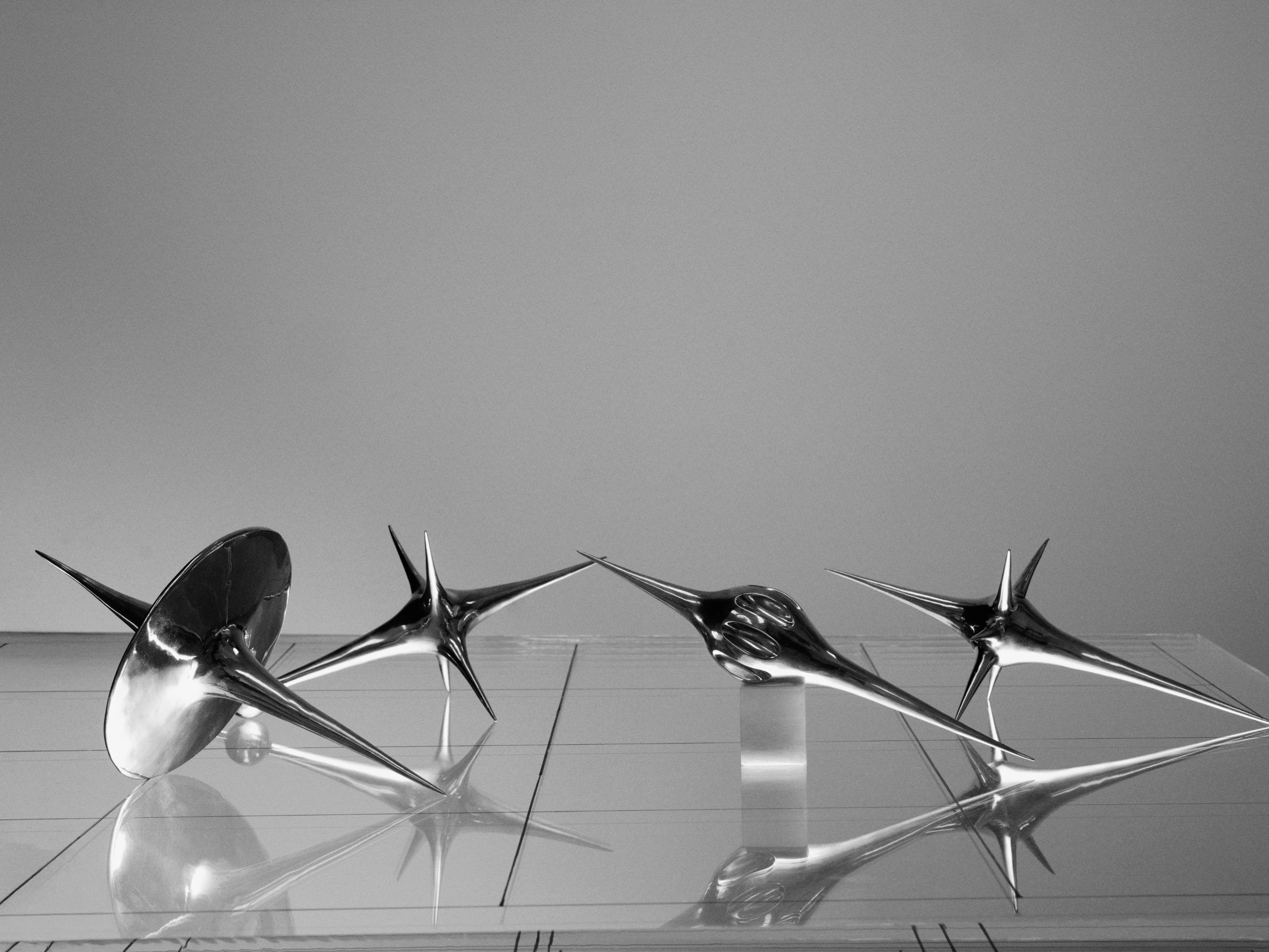 Harmonic Oscillators, art by Pilar Zeta, bronze resting pendulum sculpture photographed for L'Officiel Ibiza, 2026. Photo: Txema Yeste