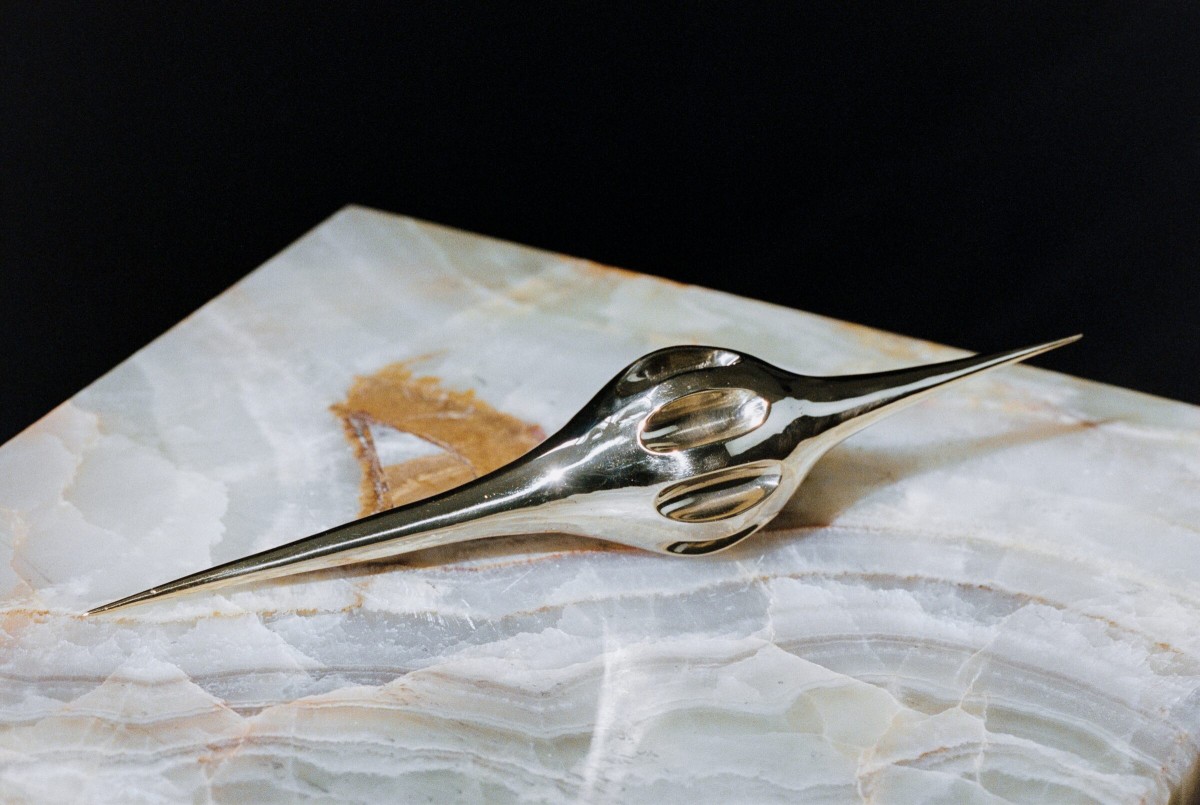 Harmonic Oscillator III, art by Pilar Zeta, polished bronze sculpture, 2026
